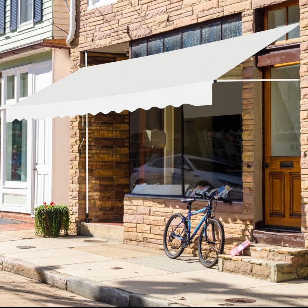 Retractable canvas shop awning