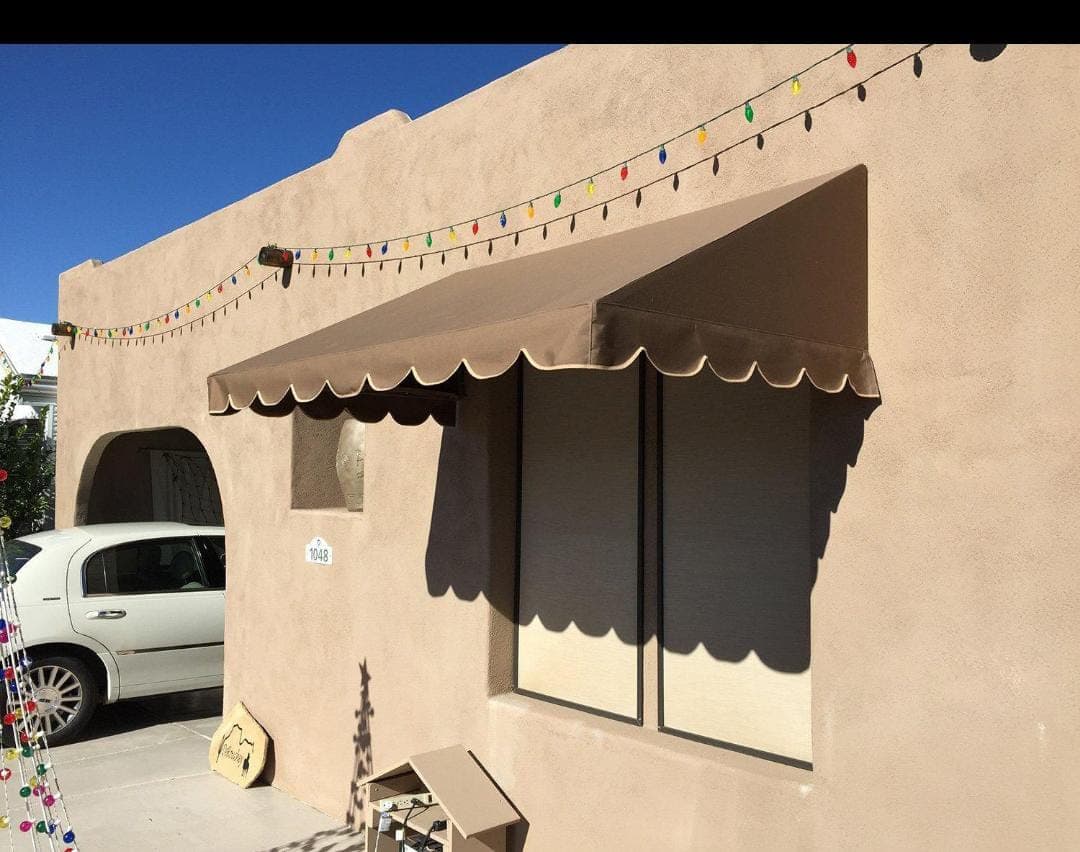 Scalloped-edge window awning